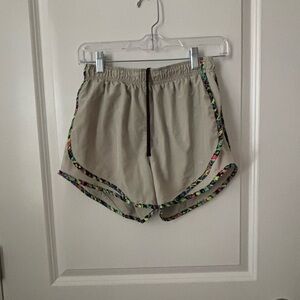 Nike Women's Beige Shorts with Colorful Trim